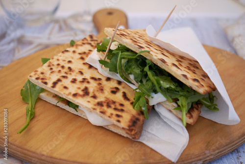 Piadina romagnola with rocket and cheese photo