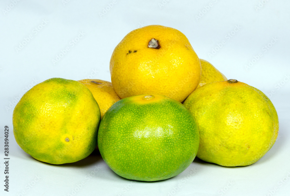 Fresh juicy clementine mandarins isolated on white Fresh juicy clementine mandarins isolated on white