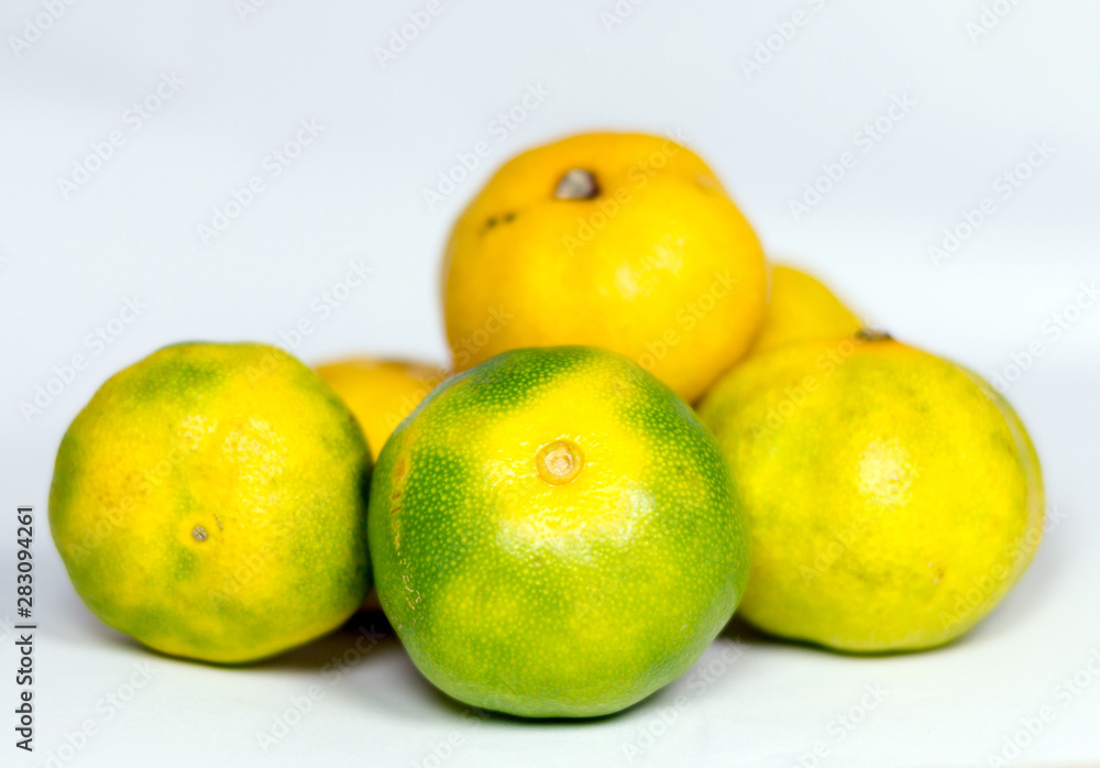 Fresh juicy clementine mandarins isolated on white Fresh juicy clementine mandarins isolated on white