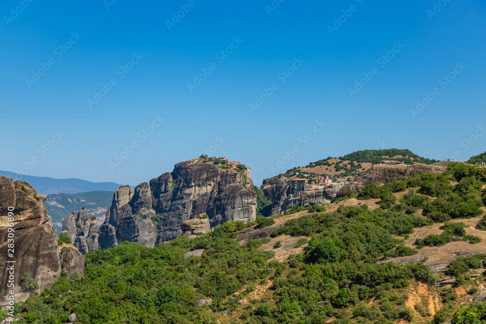 The Meteora is a rock formation in Greece hosting one of the largest and most precipitously built complexes of Eastern Orthodox monasteries.