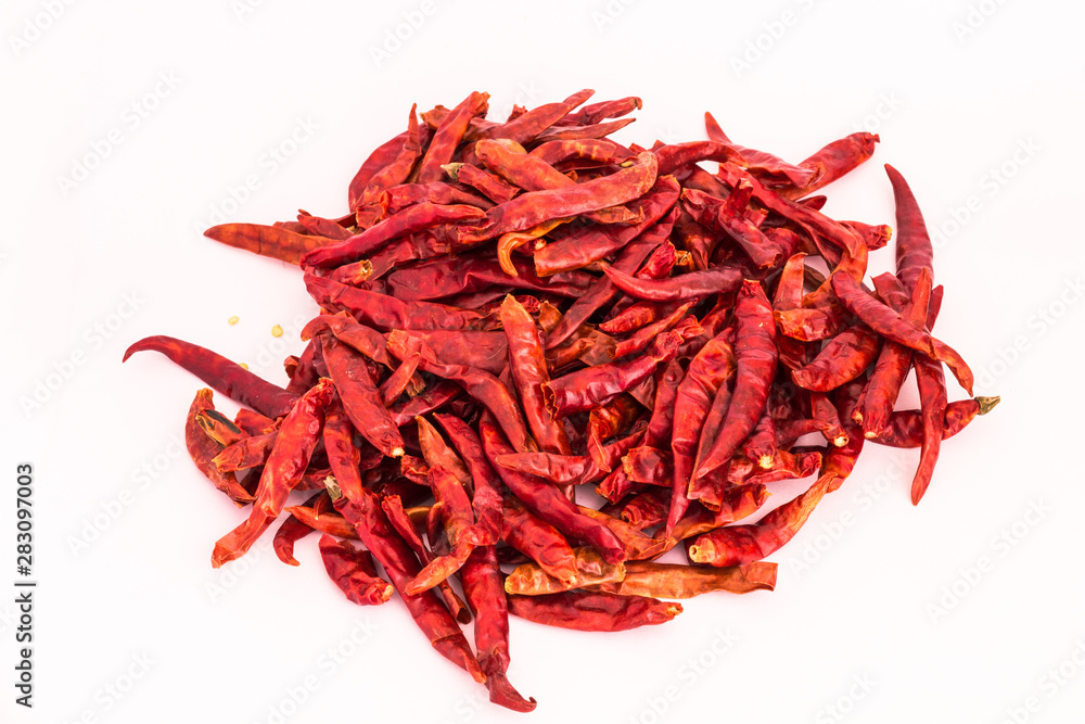 Dried red chili or chilli cayenne pepper isolated on white background Dried red chili or chilli cayenne pepper isolated on white background