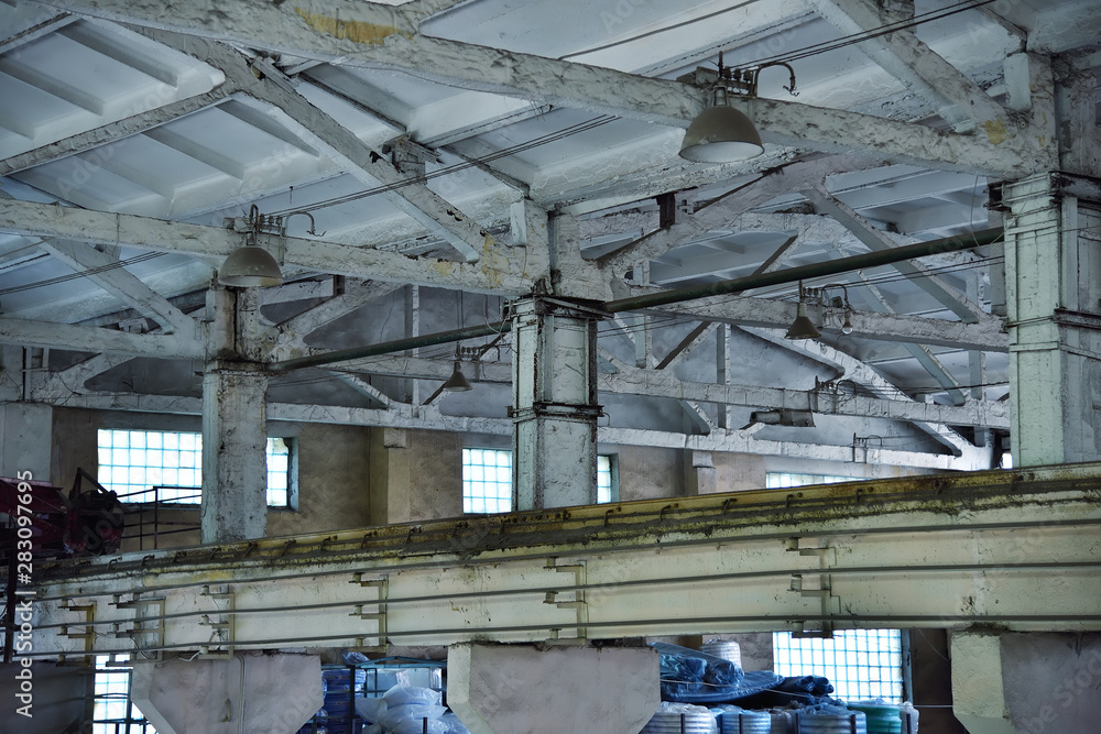 Old empty destroyed and abandoned factory. industrial concept