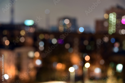 Bokeh of lights of night city as background