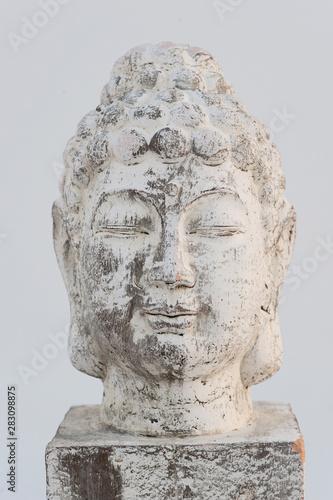 Simple Mindful Buddha Photographed On A White Background