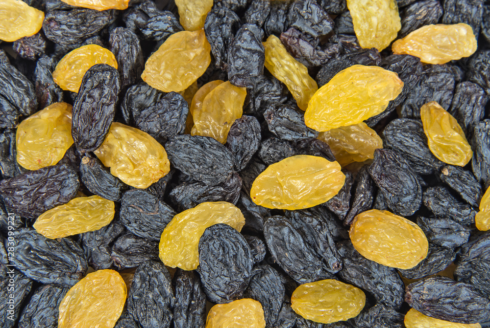 Berries of black and yellow raisins Berries of black and yellow raisins