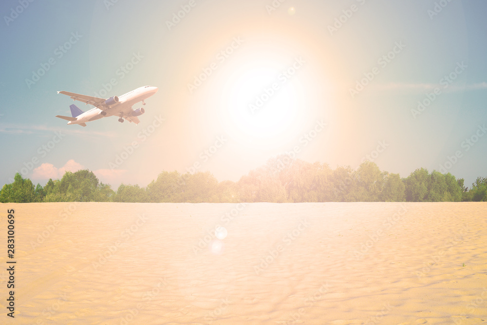 The plane flies over the desert and forest. Sunset. The plane flies over the desert and forest. Sunset.