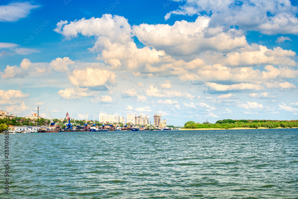 View of the river port against the cloudy sky.