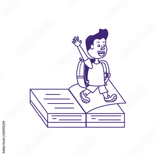 cute little student boy with book open