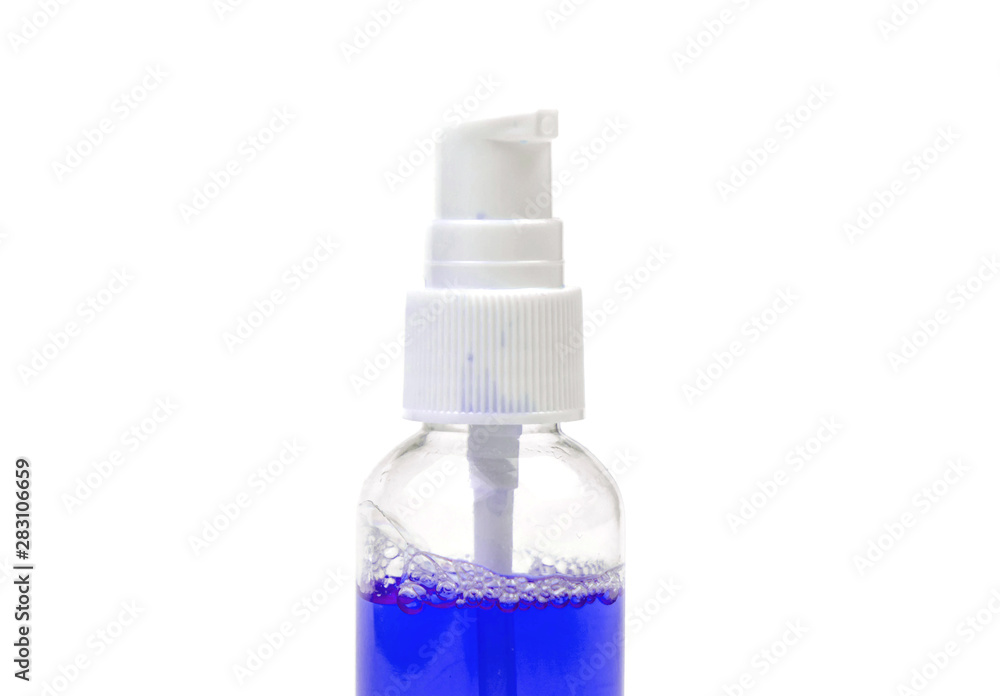 tool for tooth rinse in bottle on white isolated background