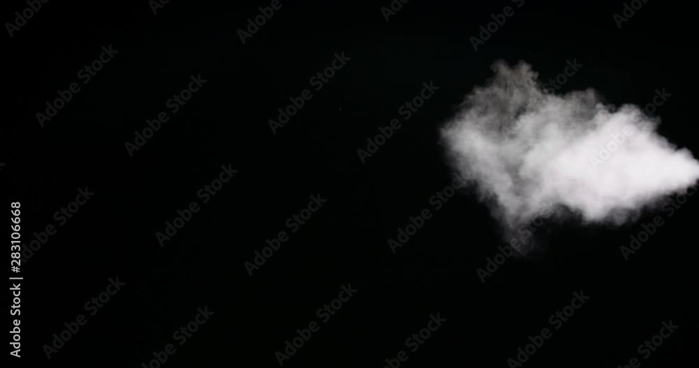 Real white mist isolated on black background with visible droplets Real white mist isolated on black background with visible droplets