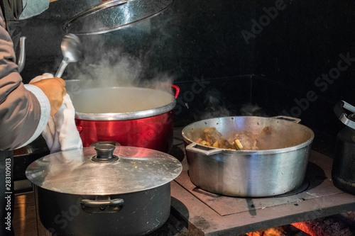 cooking stewed chicken in wood burning stove