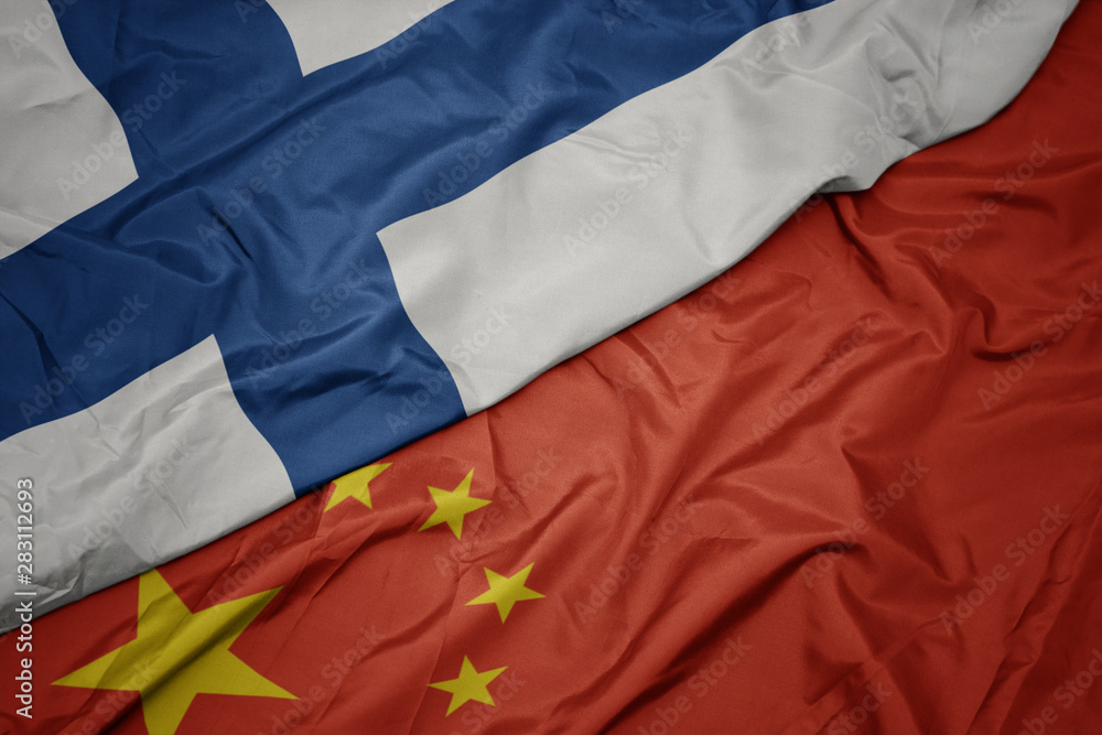 Fototapeta premium waving colorful flag of china and national flag of finland.