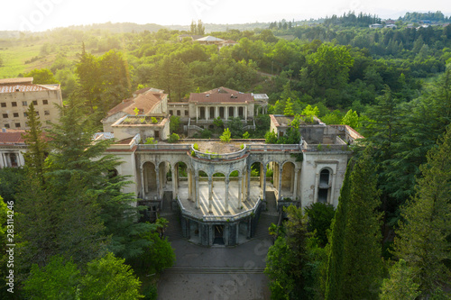 Fotografie The ruins of the old Soviet sanatorium Medea, whose architecture which is basically a synthesis of Stalinist period classical style and of Georgian ethnic decor with Gothic and Roman features