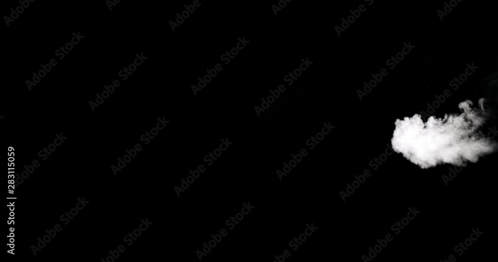 Real white steam isolated on black background with visible droplets Real white steam isolated on black background with visible droplets