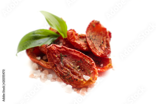 Sun dried tomatoes isolated on white