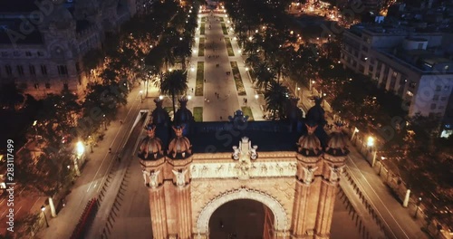 Aerial view of iconic landmark of Barcelona - Triumphal Arch (Arco de Triunfo) on central avenue at twilight, Spain photo