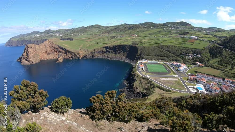 Panning top view over town of Velas, Sao Jorge island, Azores, Portugal