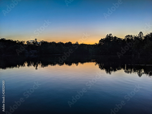 Sunset Over the Mountain Lake