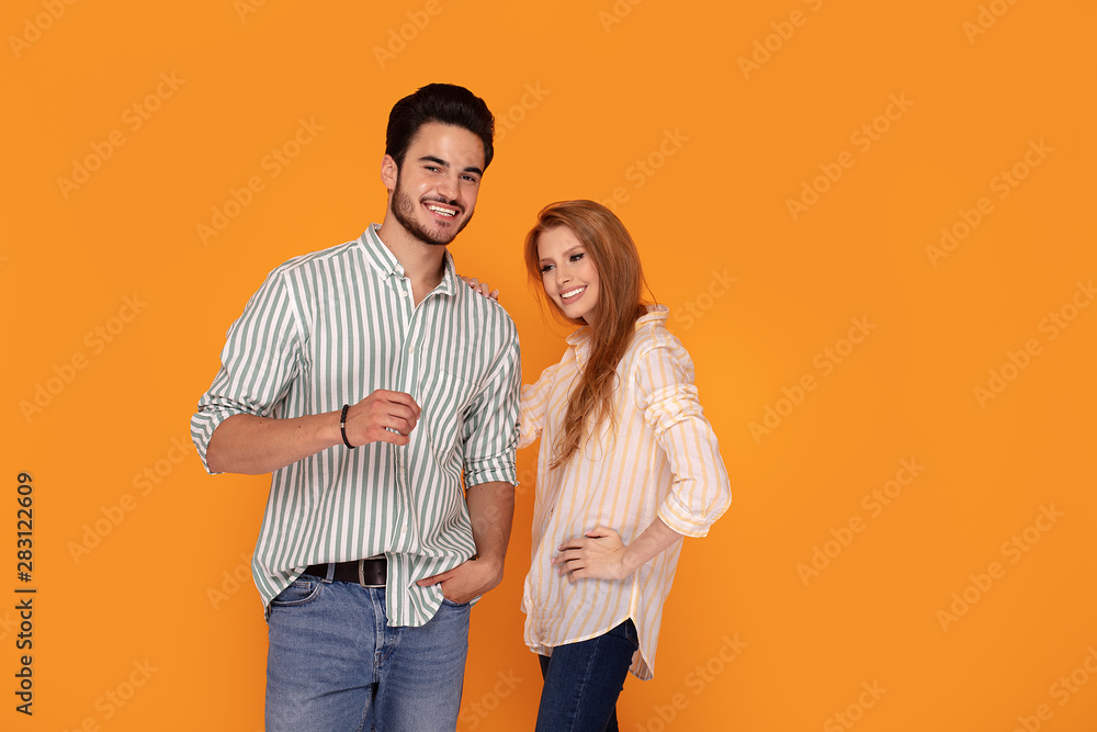 Beautiful couple smiling, posing together. Beautiful couple smiling, posing together.