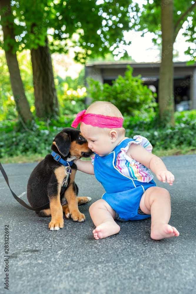 Baby with puppy