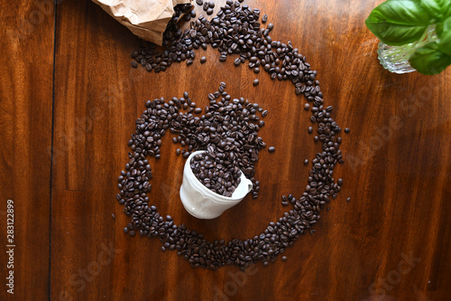 Home made coffee with coffee beans in a swirl pattern
