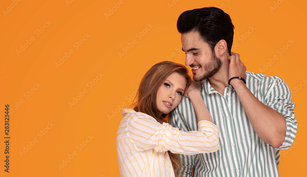 Fototapeta premium Beautiful couple smiling, posing together.