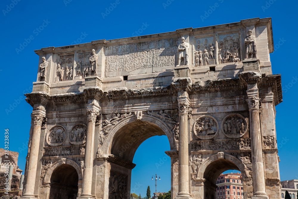 The Arch of Constantine a triumphal arch in Rome, situated between the Colosseum and the Palatine Hill built on the year 315 AD