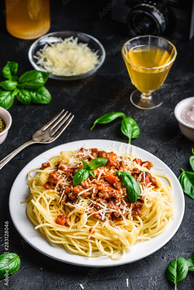 Spaghetti with bolognese sauce, parmesan and basil Spaghetti with bolognese sauce, parmesan and basil