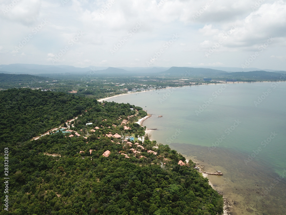 Aerial view of luxury resort with private villas and pools next the beach and ocean. Phu Quoc, Vietnam