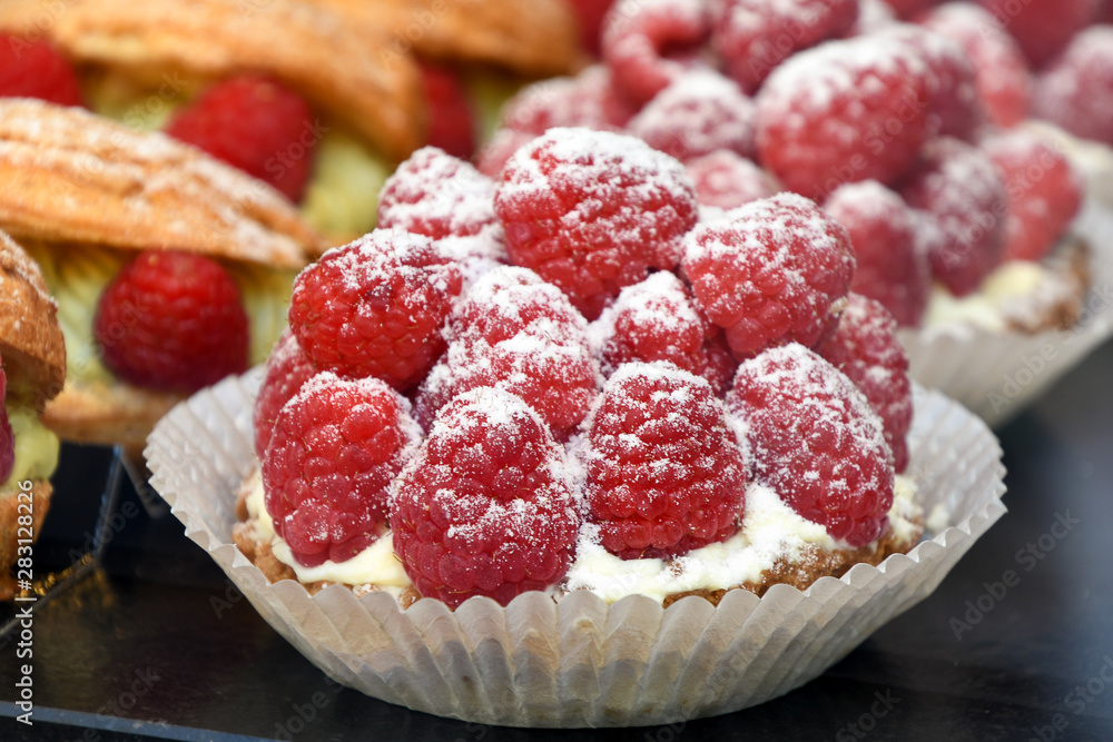 close up of red raspberry tart in bakery close up of red raspberry tart in bakery