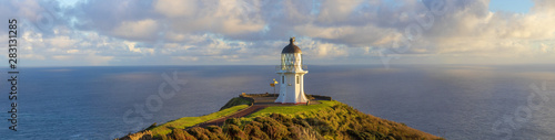 Cape Reinga lighthouse panorama, Pacific ocean, New Zealand photo