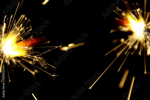 Wallpaper Mural Hand sparkler on black background Torontodigital.ca