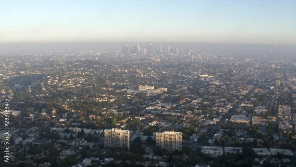 Aerial, pan, drone shot, over the city, overlooking the downtown of Los Angeles, on a sunny, summer day, in California, USA Aerial, pan, drone shot, over the city, overlooking the downtown of Los Angeles, on a sunny, summer day, in California, USA
