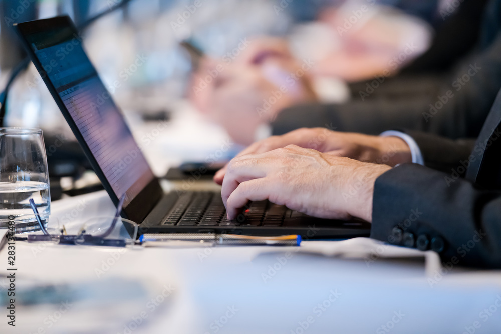 close up of business people hands using laptop computer close up of business people hands using laptop computer