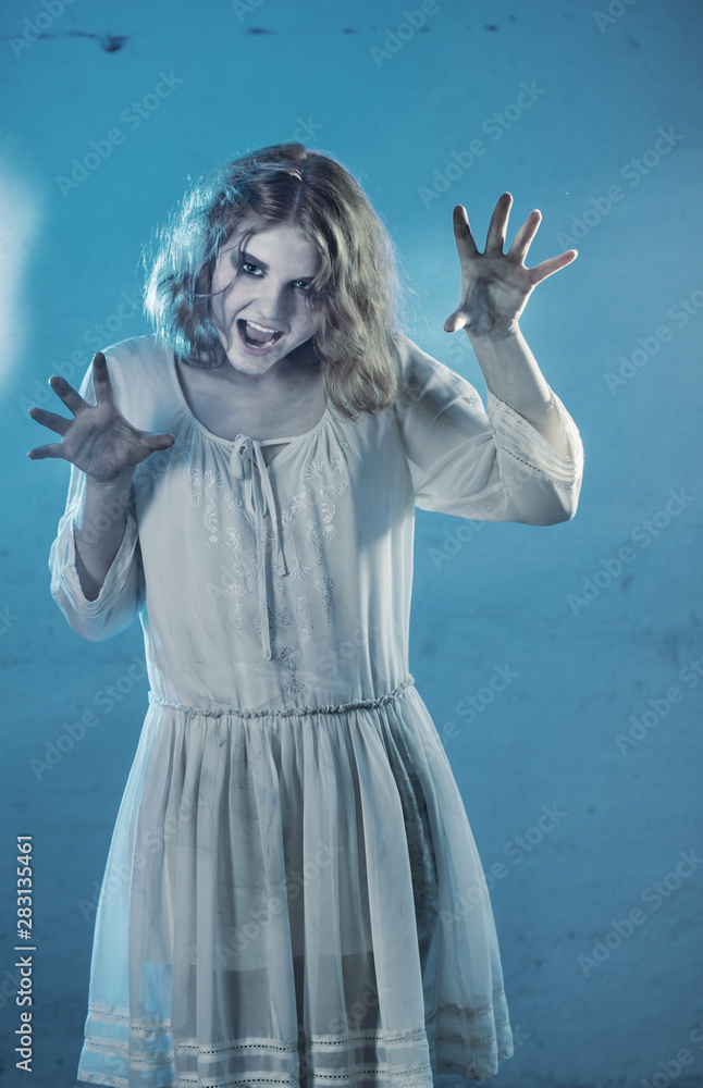 scary girl in white dress from horror film in room Stock Photo | Adobe Stock