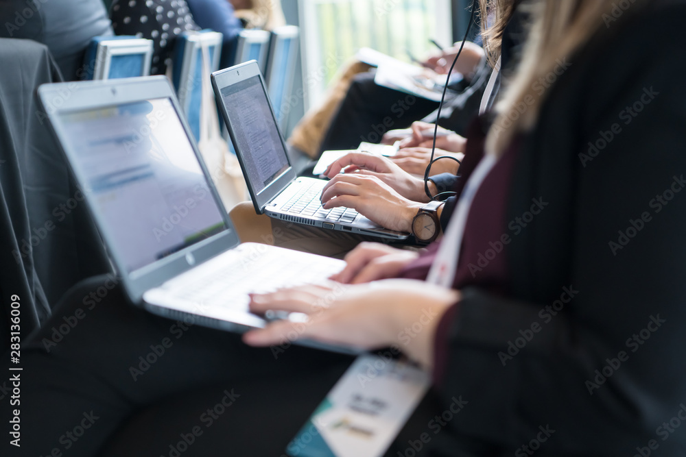 close up of business people hands using laptop computer close up of business people hands using laptop computer