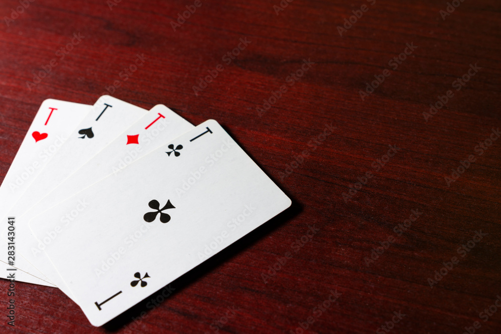 Game cards on the table, table texture red