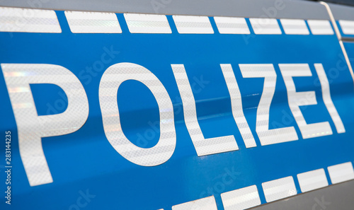 Polizeifahrzeug, Beschriftung photo