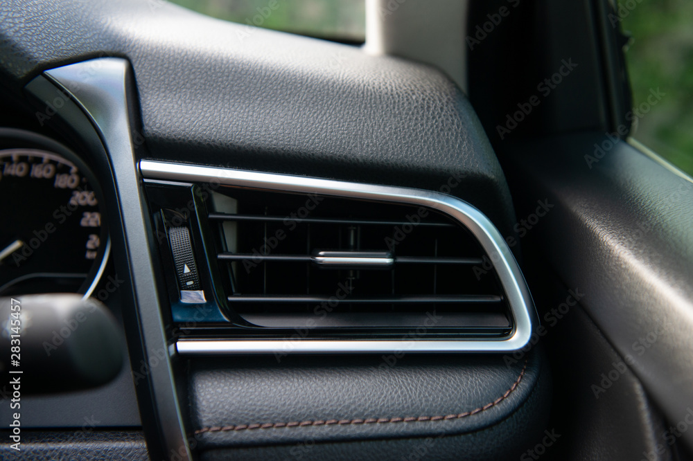 Car air conditioning panel on the luxury car console
