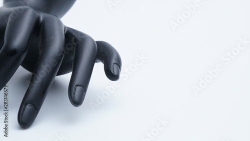 Black mannequin hands on the white background.
