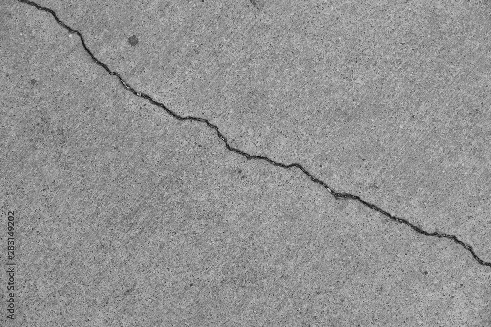 Obraz premium Crack on a concrete surface in Los Angeles for interior design.