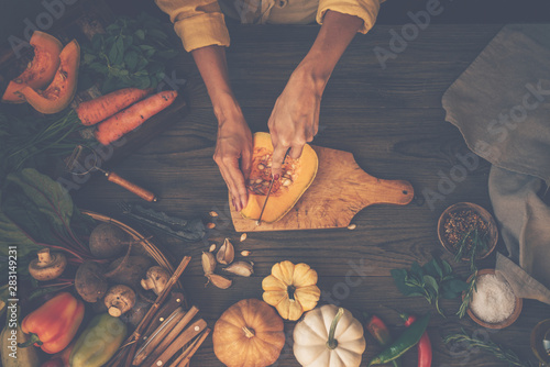 Food and drink. Diet and nutrition concept. Seasonal fall autumn pumpkin, carrot with ingredients on a table. Fall cozy background, top view flat lay.