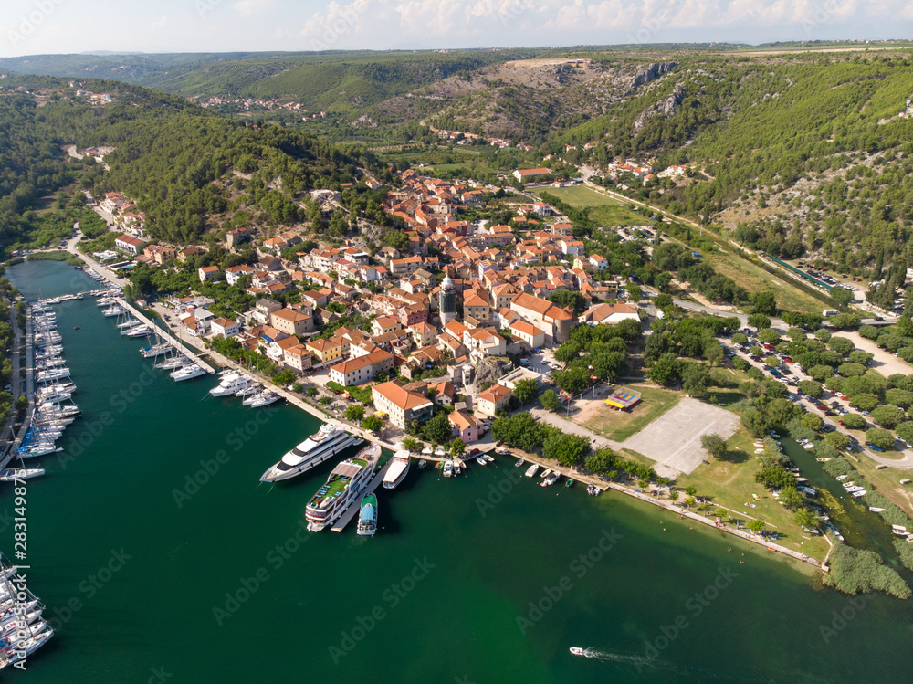 Croatia, august 2019: Aerial view of Krka National Park, Prokljansko lake, Croatia, Europe. Picturesque summer cityscape of Skradin port. Traveling concept background.