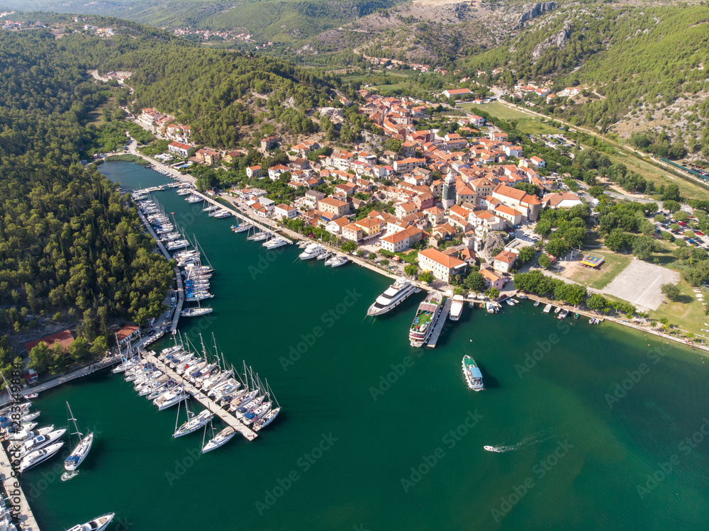 Croatia, august 2019: Aerial view of Krka National Park, Prokljansko lake, Croatia, Europe. Picturesque summer cityscape of Skradin port. Traveling concept background.