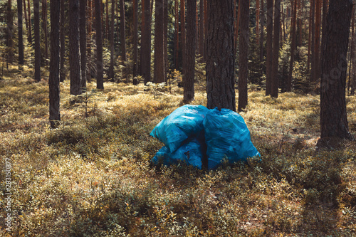 Rubbish plastic bags in the forest. Ecology and environment poluttion concept