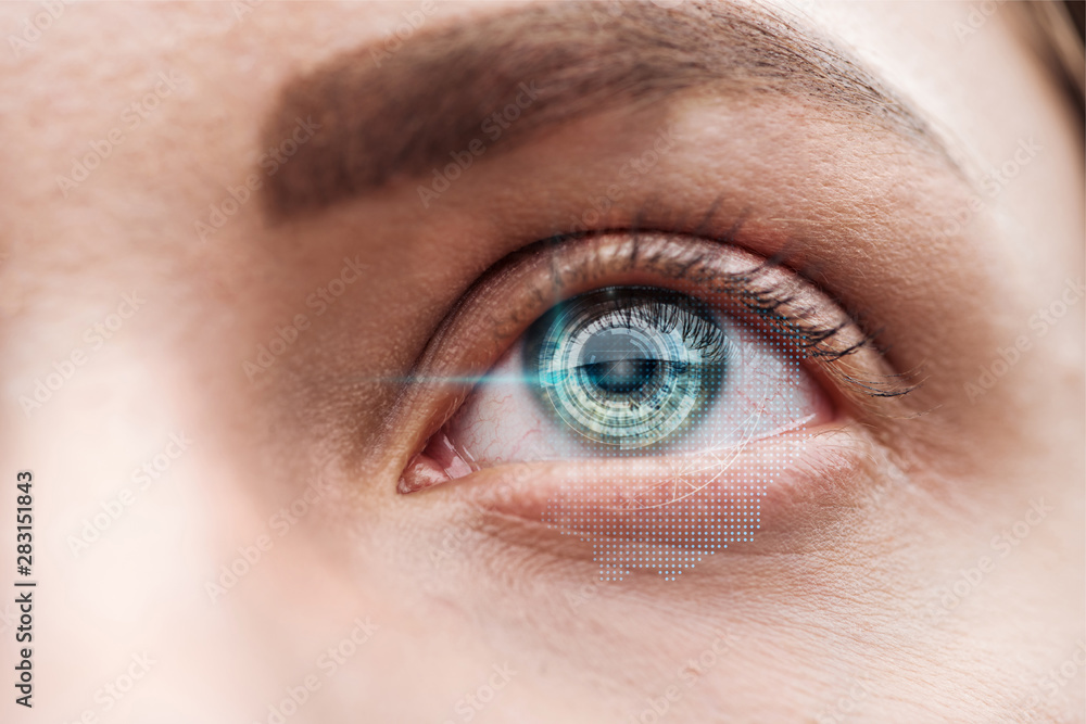 Obraz premium close up view of human green eye with data illustration, robotic concept