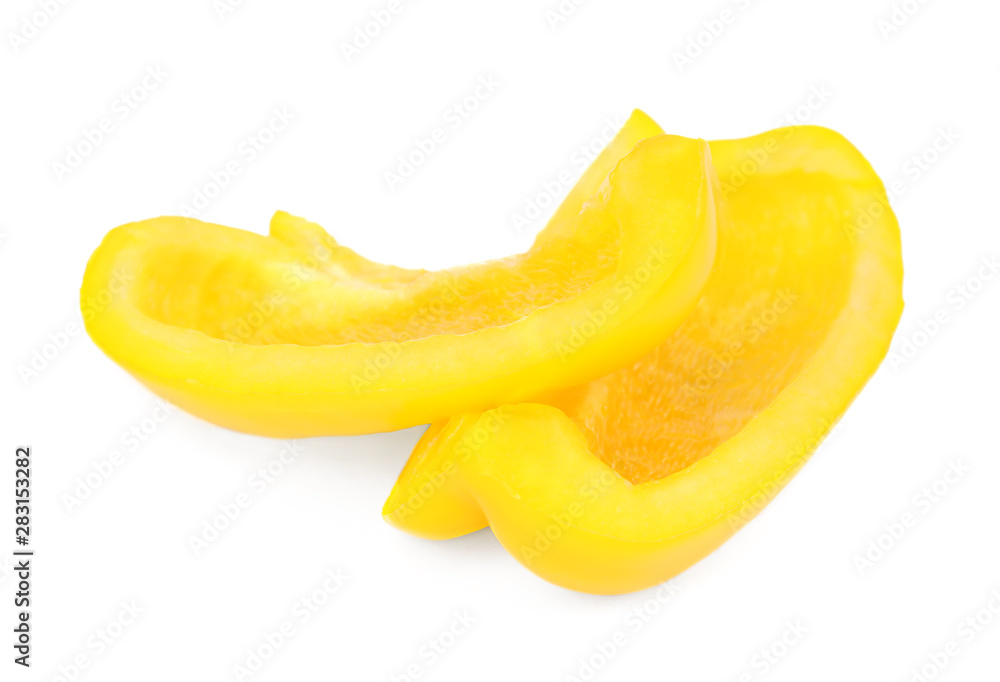 Cut yellow bell pepper isolated on white