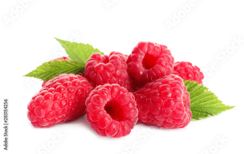 Delicious ripe sweet raspberries with leaves isolated on white