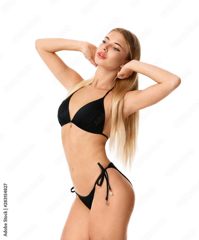 Pretty young woman wearing stylish bikini on white background - obrazy, fototapety, plakaty 