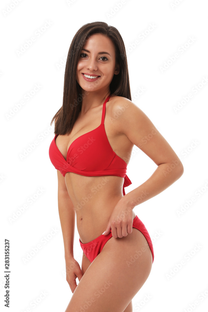 Pretty sexy woman with slim body in stylish red bikini on white background Pretty sexy woman with slim body in stylish red bikini on white background